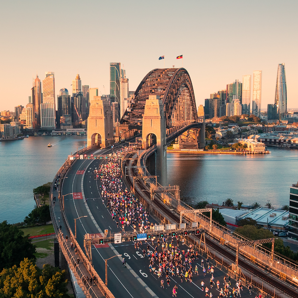 Sydney Harbour Bridge marathon with runners at sunrise